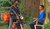 Stefan Schwarzer is drawing in his white garden chair, a motorcyclist stops and talks to him.