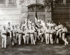 Group picture of the Friesen school gymnastics club with club flag in front of the sports hall
